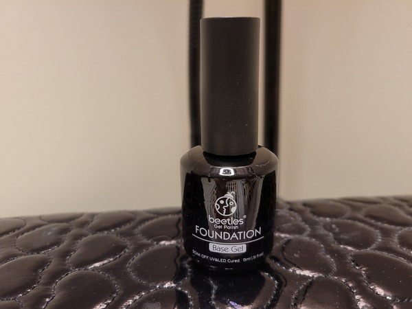 Nail polish swatch / manicure of shade Beetles Base Coat
