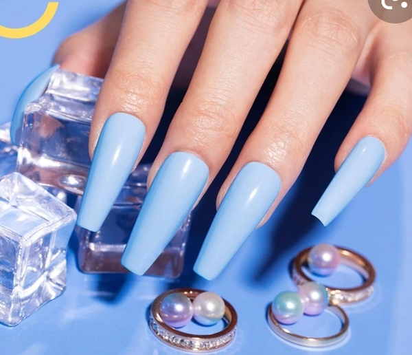Nail polish swatch / manicure of shade Beetles Diana Sky Blue