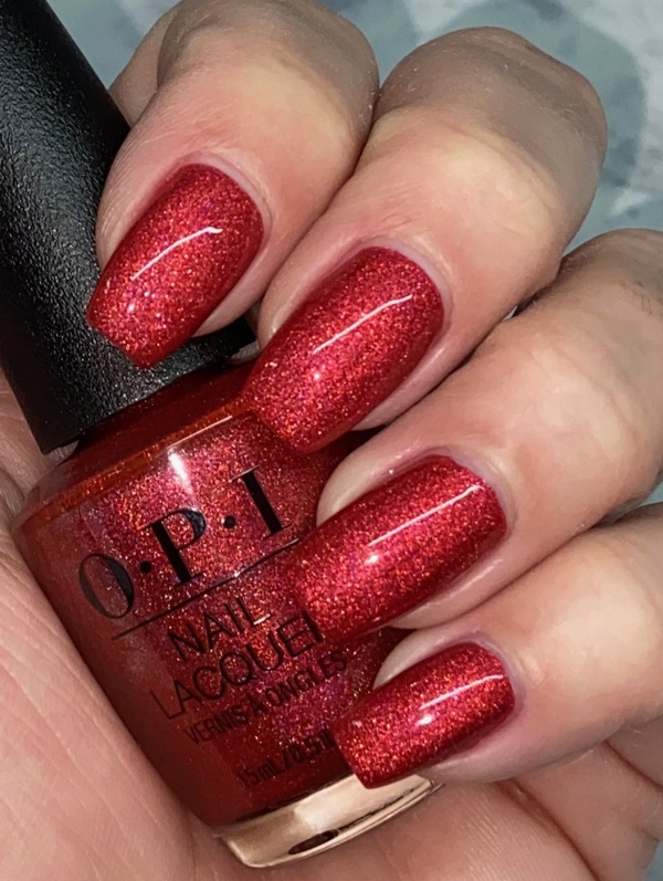 Nail polish swatch / manicure of shade OPI Paint the Tinseltown Red