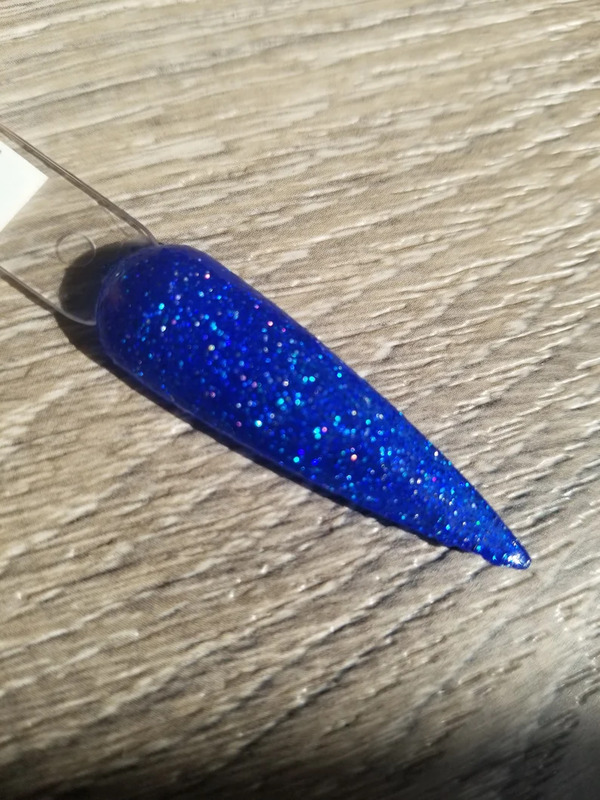 Nail polish swatch / manicure of shade 2Chicks1Dip Glittery Tail