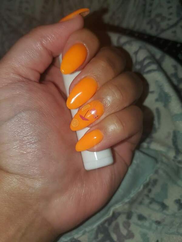 Nail polish swatch / manicure of shade Sparkle and Co. Tangerine Tiki Crush