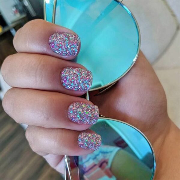 Nail polish swatch / manicure of shade Sparkle and Co. Rainbow Fish
