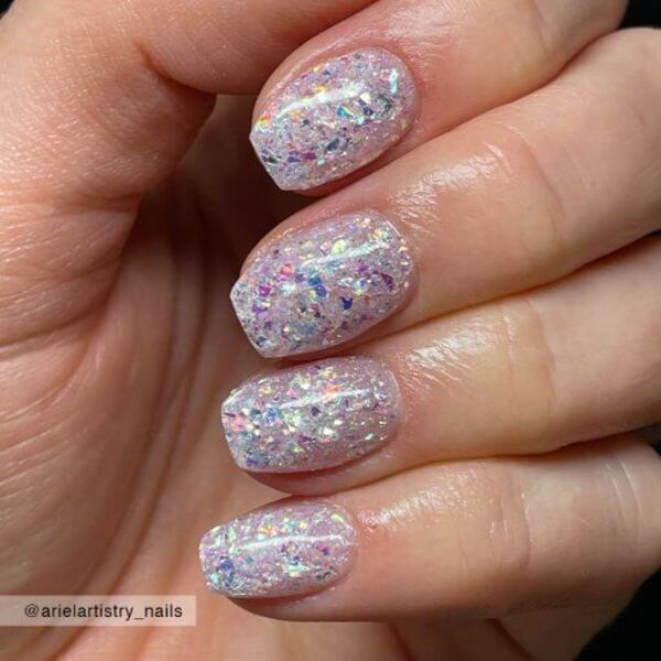 Nail polish swatch / manicure of shade Sparkle and Co. Shell we Garden