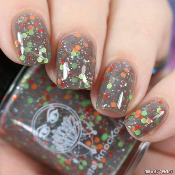Nail polish swatch / manicure of shade Crystal Knockout Hand Over the Treats