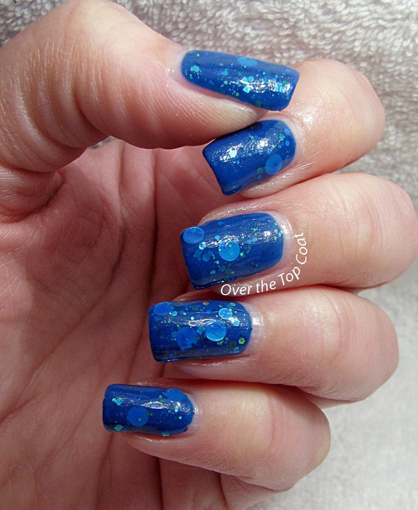 Nail polish swatch / manicure of shade Above the Curve We Are The World