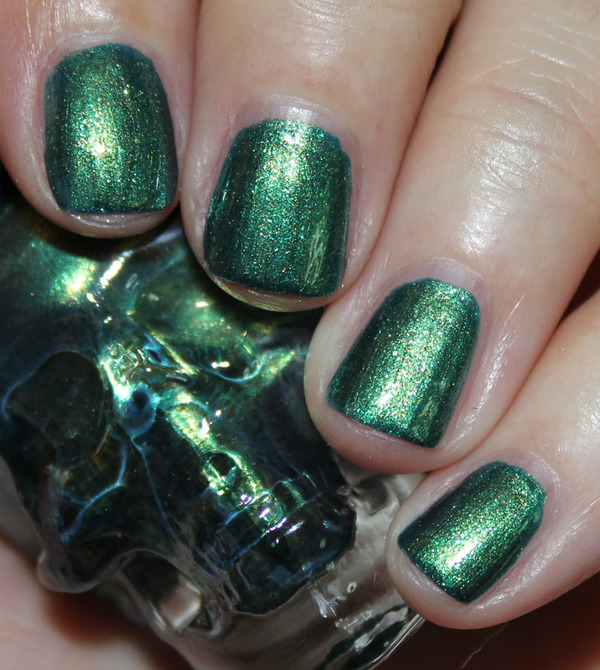 Nail polish swatch / manicure of shade Blackheart Green Yellow Shimmer