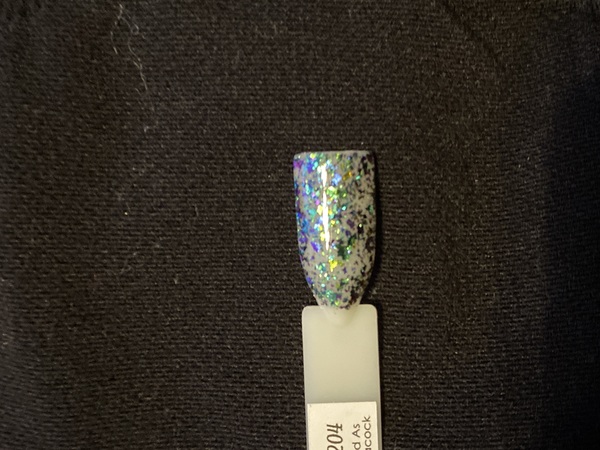 Nail polish swatch / manicure of shade Sparkle and Co. Proud as a Peacock