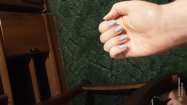 Nail polish swatch / manicure of shade DND DC Milky Blue