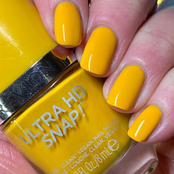 Nail polish swatch / manicure of shade Revlon Marigold Maven