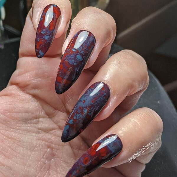 Nail polish swatch / manicure of shade Sinful Colors Redrum