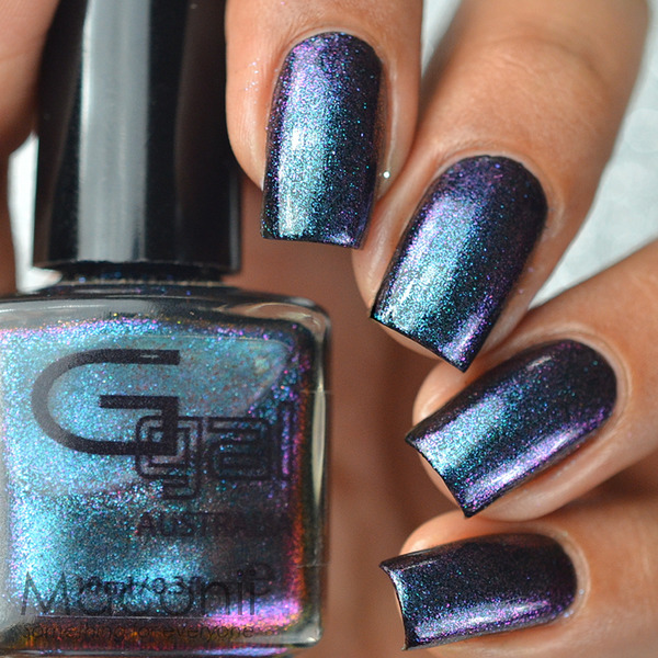 Nail polish swatch / manicure of shade Glitter Gal Midnight Lake