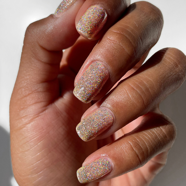 Nail polish swatch / manicure of shade Cirque Colors Champagne Diamond