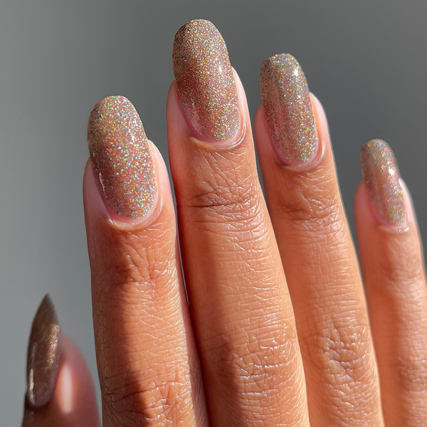 Nail polish swatch / manicure of shade Cirque Colors Champagne Diamond