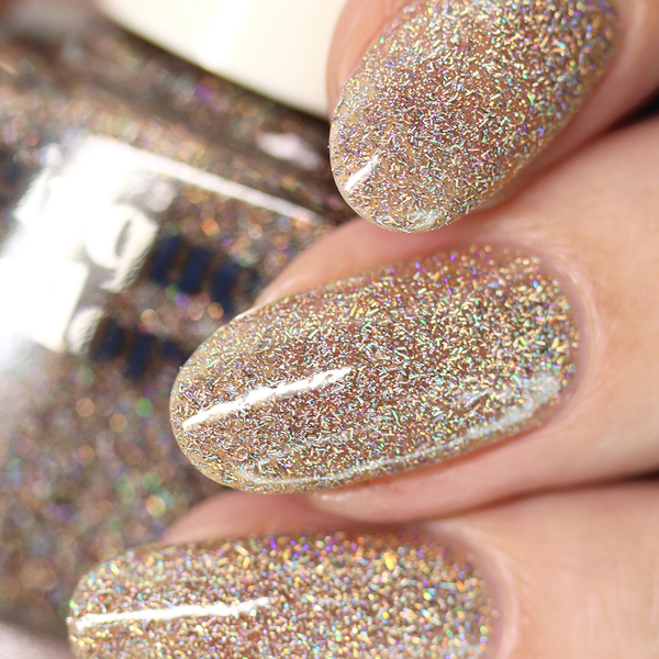 Nail polish swatch / manicure of shade Cirque Colors Champagne Diamond