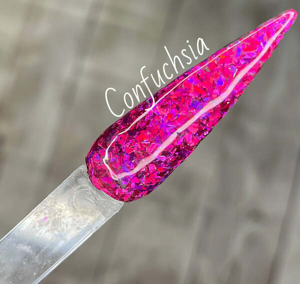 Nail polish swatch / manicure of shade Ritzy Dips Confuchsia