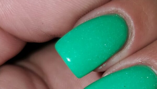 Nail polish swatch / manicure of shade Revel Kiwi