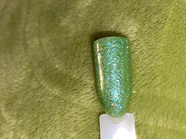 Nail polish swatch / manicure of shade Sparkle and Co. Irish Fairytale