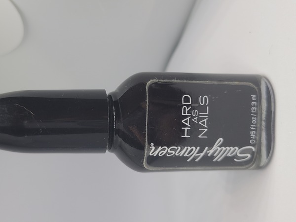 Nail polish swatch / manicure of shade Sally Hansen Black Heart