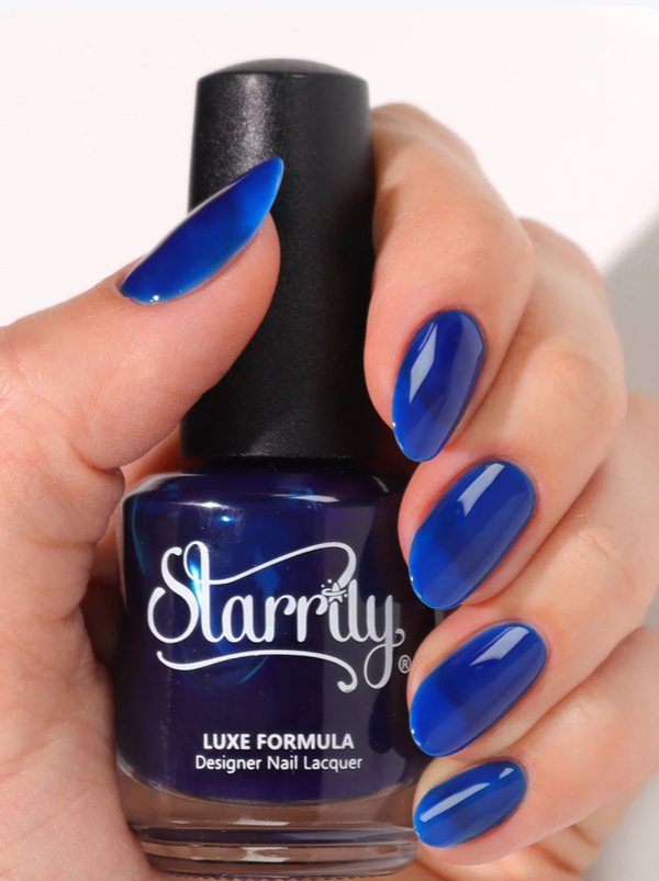 Nail polish swatch / manicure of shade Starrily Blue fire Jelly