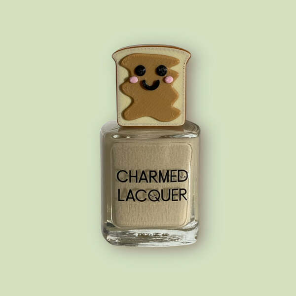 Nail polish swatch / manicure of shade Charmed lacquer Mr. Peanut butter