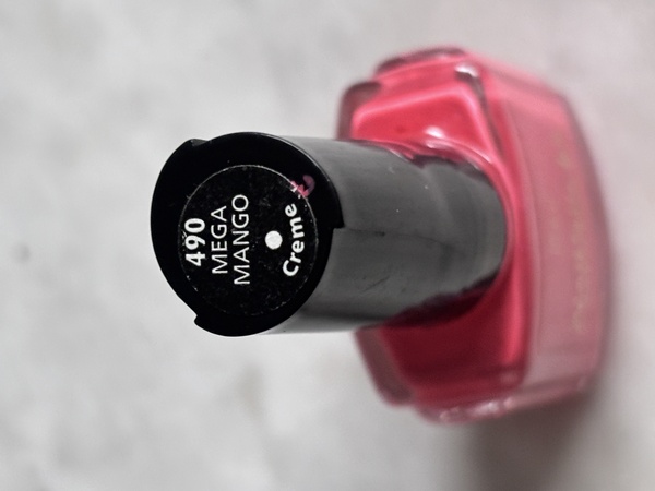 Nail polish swatch / manicure of shade CoverGirl Mega Mango