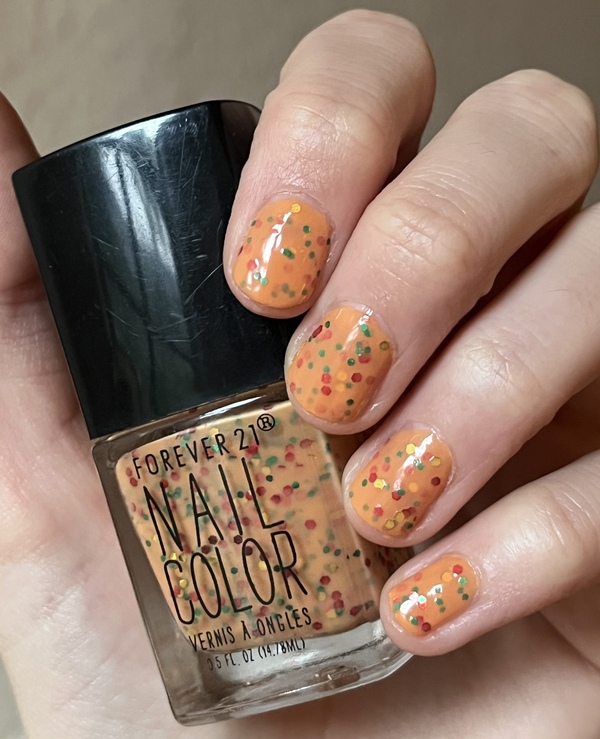 Nail polish swatch / manicure of shade Forever 21 Dark Orange-Multi