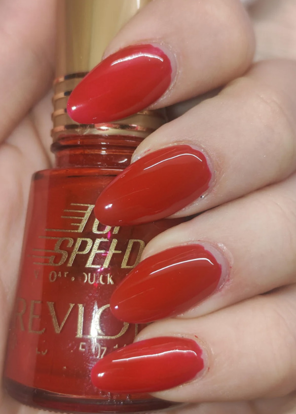 Nail polish swatch / manicure of shade Revlon Blaze