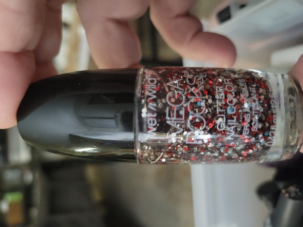 Nail polish swatch / manicure of shade wet n wild Starlet in Scarlet