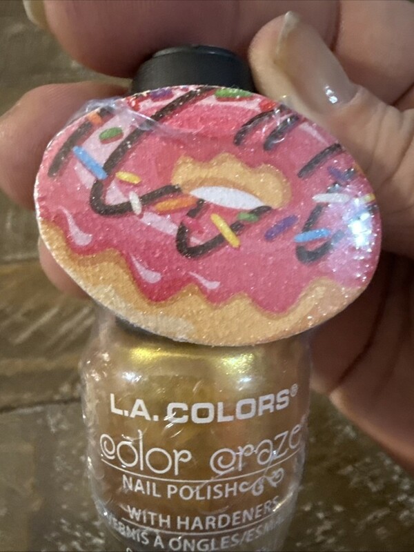 Nail polish swatch / manicure of shade LA Colors Color Craze Golden Glaze