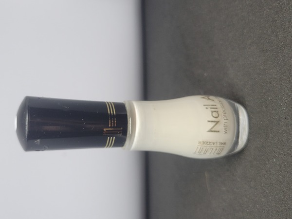 Nail polish swatch / manicure of shade Milani White Canvas
