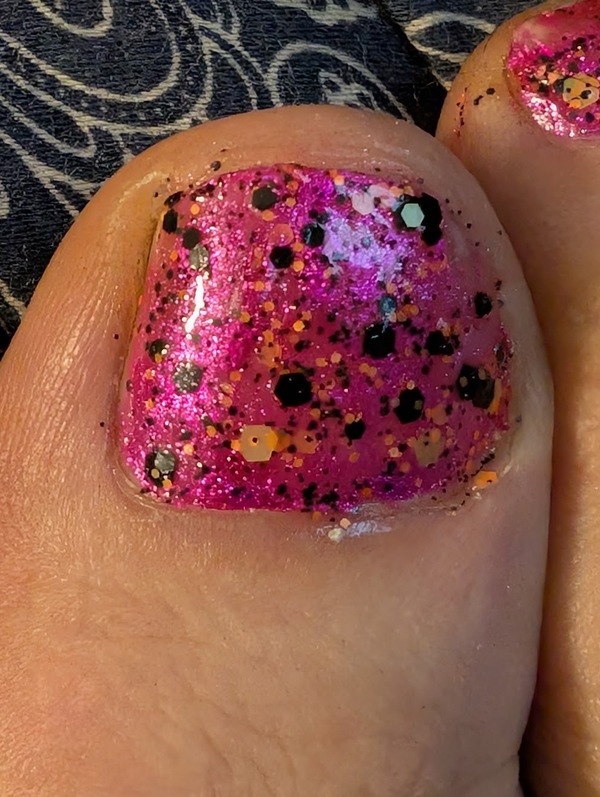 Nail polish swatch / manicure of shade J Nail Lacquer Orange Spot