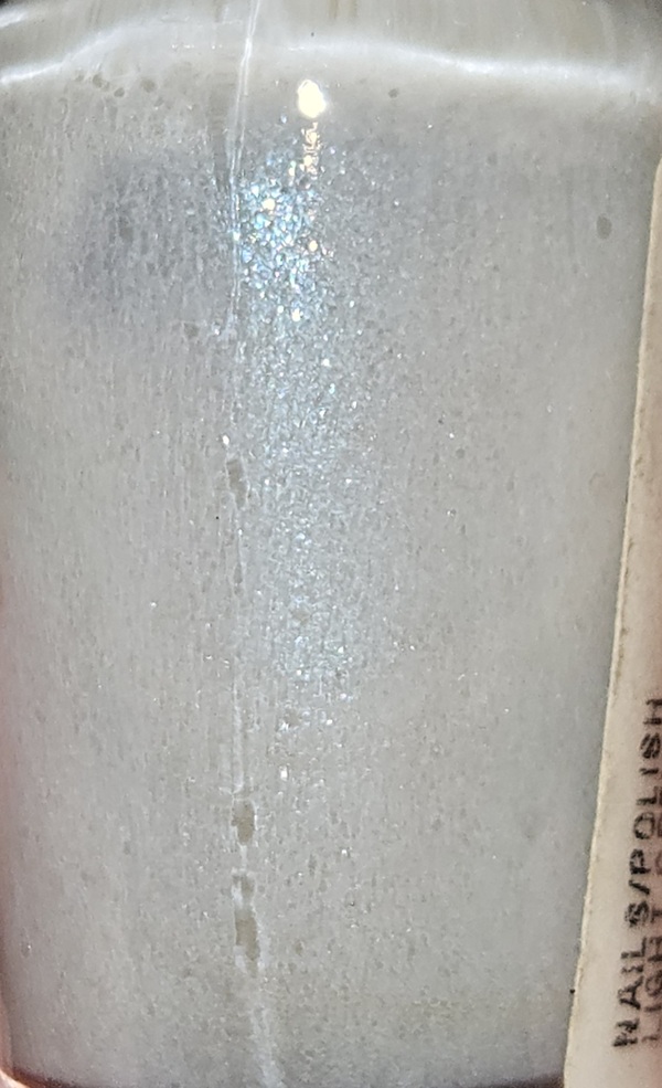 Nail polish swatch / manicure of shade Love and Beauty Light Grey-Multi