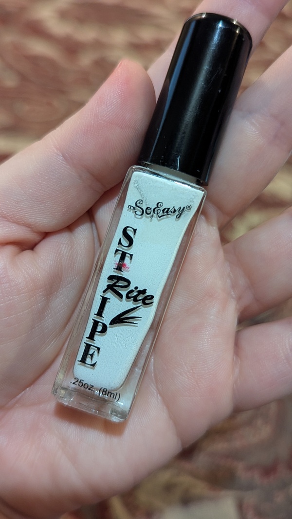 Nail polish swatch / manicure of shade Stripe Rite (None) White