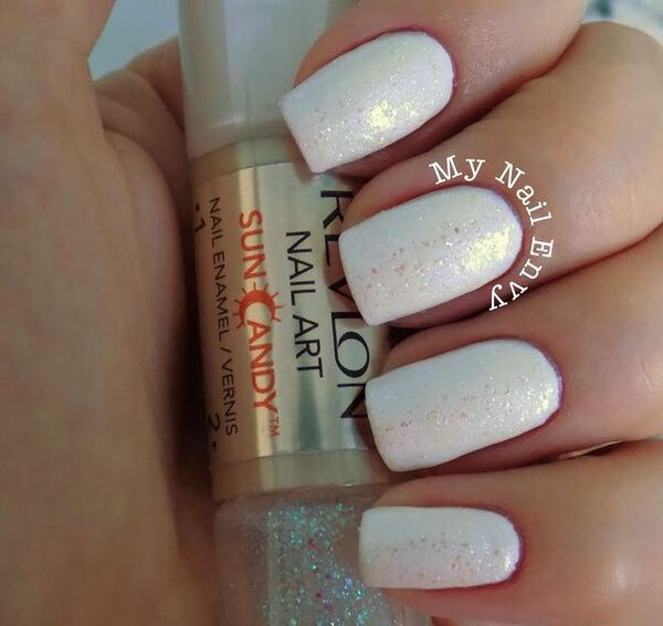 Nail polish swatch / manicure of shade Revlon White Hot