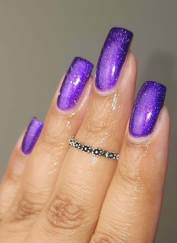 Nail polish swatch / manicure of shade Arcana Lacquer Collapsing Stars