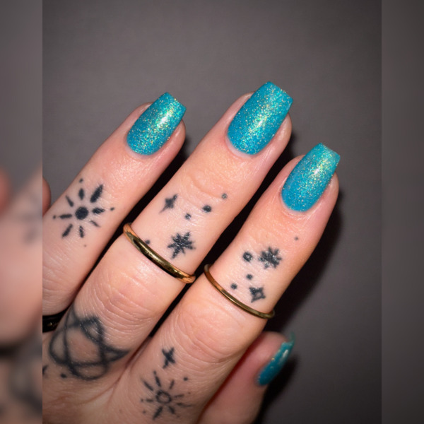 Nail polish swatch / manicure of shade Tyler's Trinkets Blue Torch