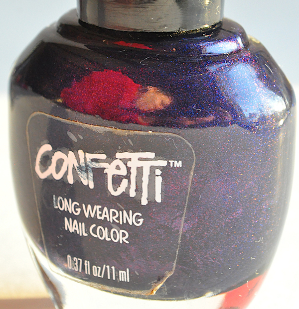 Nail polish swatch / manicure of shade Confetti Pop The Cork Purple