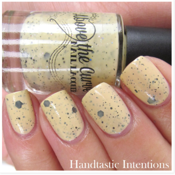 Nail polish swatch / manicure of shade Above the Curve Hufflepuff