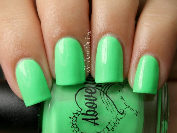 Nail polish swatch / manicure of shade Above the Curve Neon Green