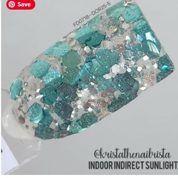 Nail polish swatch / manicure of shade Revel DOR25-5
