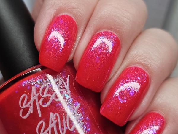 Nail polish swatch / manicure of shade Sassy Sauce Polish Electric Lava With Glitter Veins