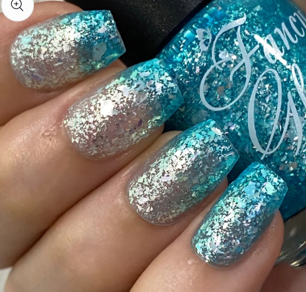 Nail polish swatch / manicure of shade Fancy Gloss Frozen Paradise