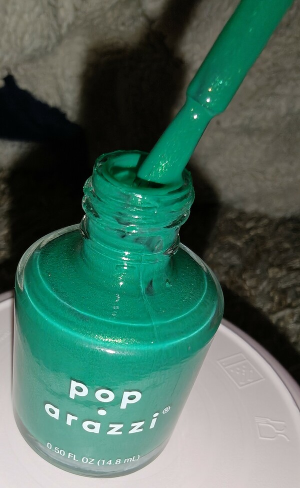 Nail polish swatch / manicure of shade Pop-arazzi Head Over Teals