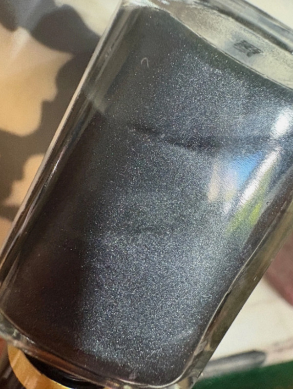 Nail polish swatch / manicure of shade Black Radiance Smoke Signals