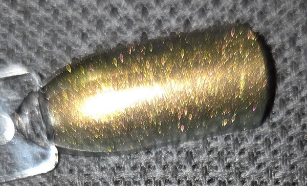 Nail polish swatch / manicure of shade Morovan Green gold duochrome
