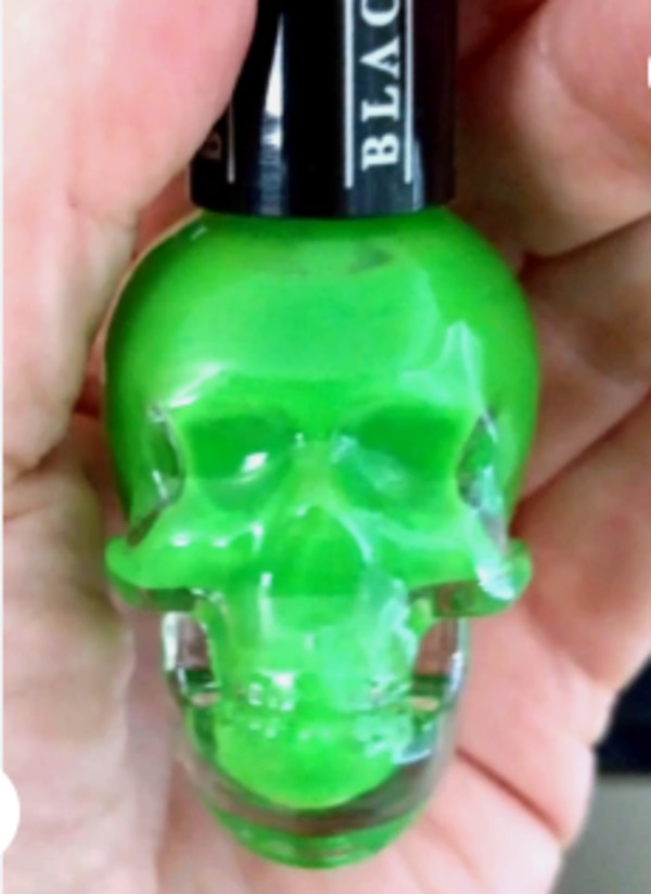 Nail polish swatch / manicure of shade Blackheart Rawr Green