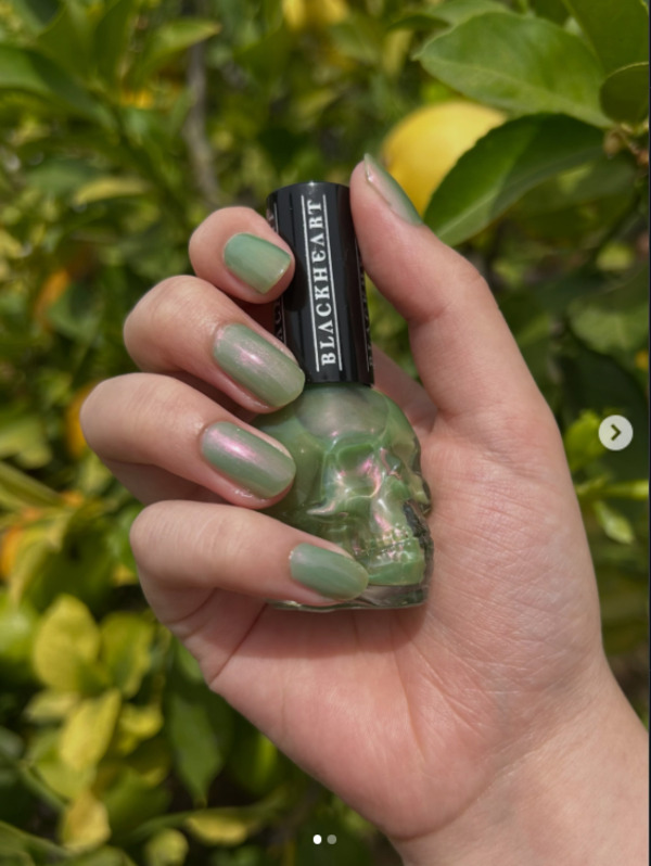 Nail polish swatch / manicure of shade Blackheart Faerie Green