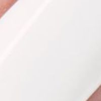 Nail polish swatch of shade China Glaze White on White