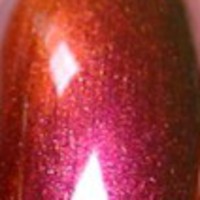 Nail polish swatch of shade Sally Hansen Amber Ruby