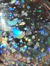 Nail polish swatch of shade Nicole by OPI Pixie Glitter